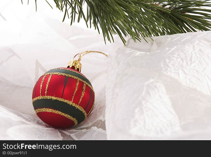 Christmas table. evergreen branch and ball. Christmas table. evergreen branch and ball