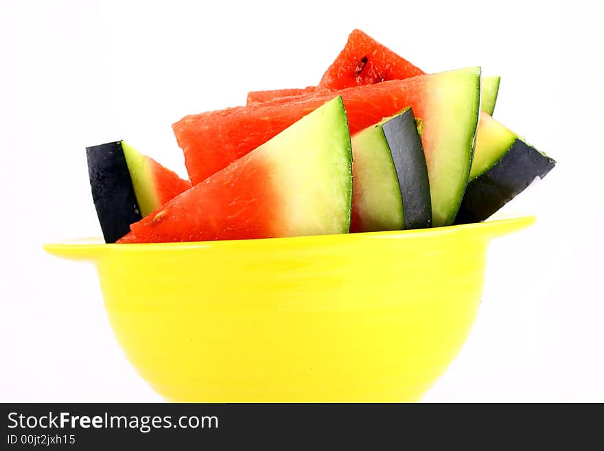 Background of brightly lit red watermelon slices.