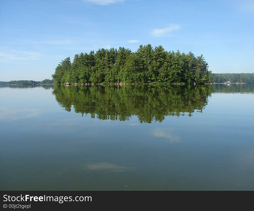 This photo was taken early in the morning while kayaking on Three Mile Pond in South China, Maine. This photo was taken early in the morning while kayaking on Three Mile Pond in South China, Maine.