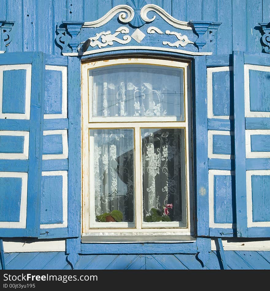 Traditional russian window with shutter from Engels