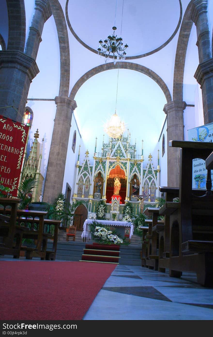 Altar of Candelaria Church in Canary Islands a place of pilgrimage, blue hue version. Altar of Candelaria Church in Canary Islands a place of pilgrimage, blue hue version