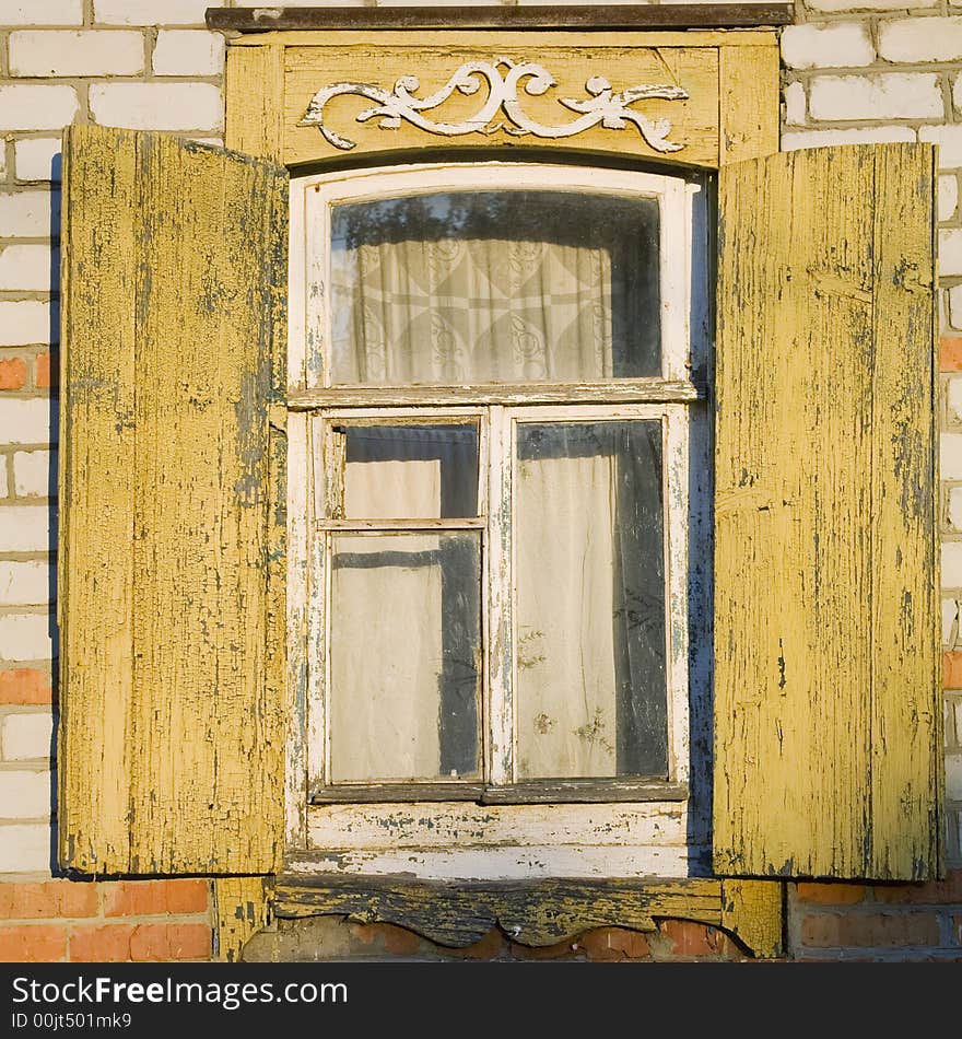 Traditional russian window with shutter from Engels