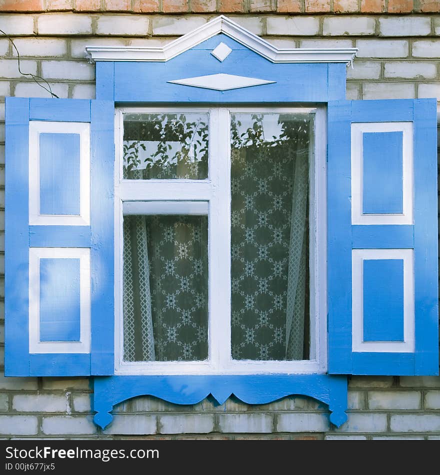 Traditional russian window with shutter from Engels