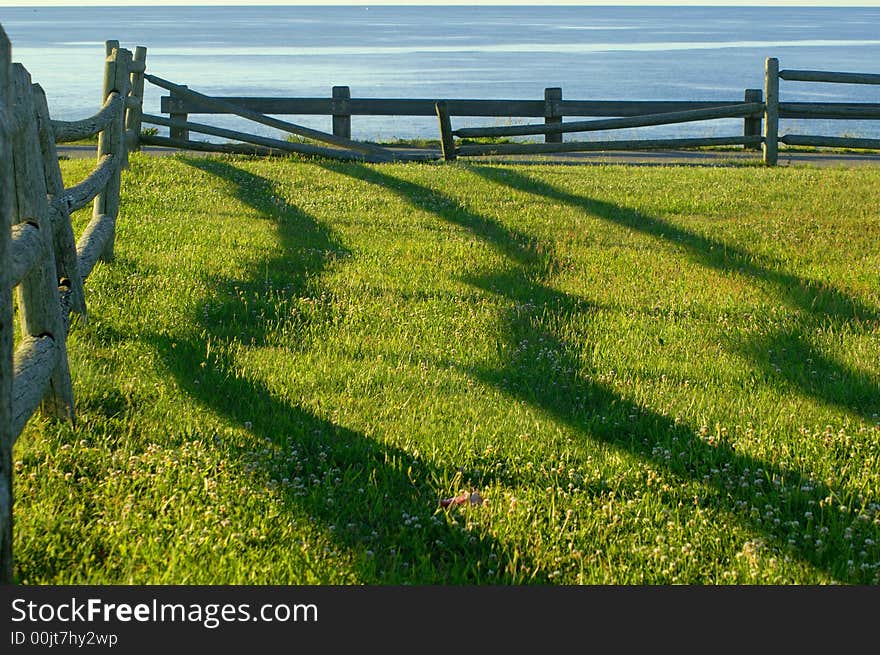 Fence Shadows At Sunrise