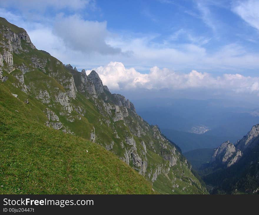 A beautiful sky, a beautiful mountain and a  grass green. A beautiful sky, a beautiful mountain and a  grass green.