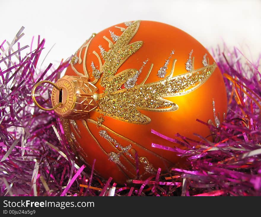 Orange new year ball on white background