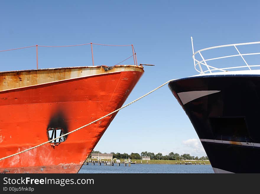 Two large ships anchored in the harbor. Two large ships anchored in the harbor