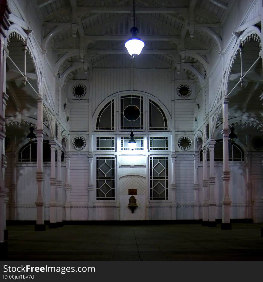 Old white gazebo at night