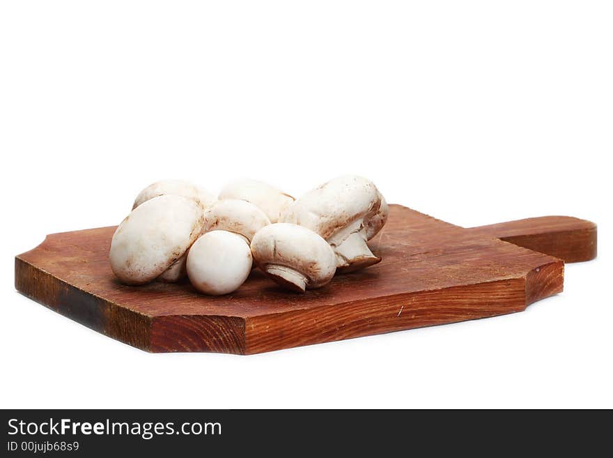 Close up of button mushrooms isolated on white background