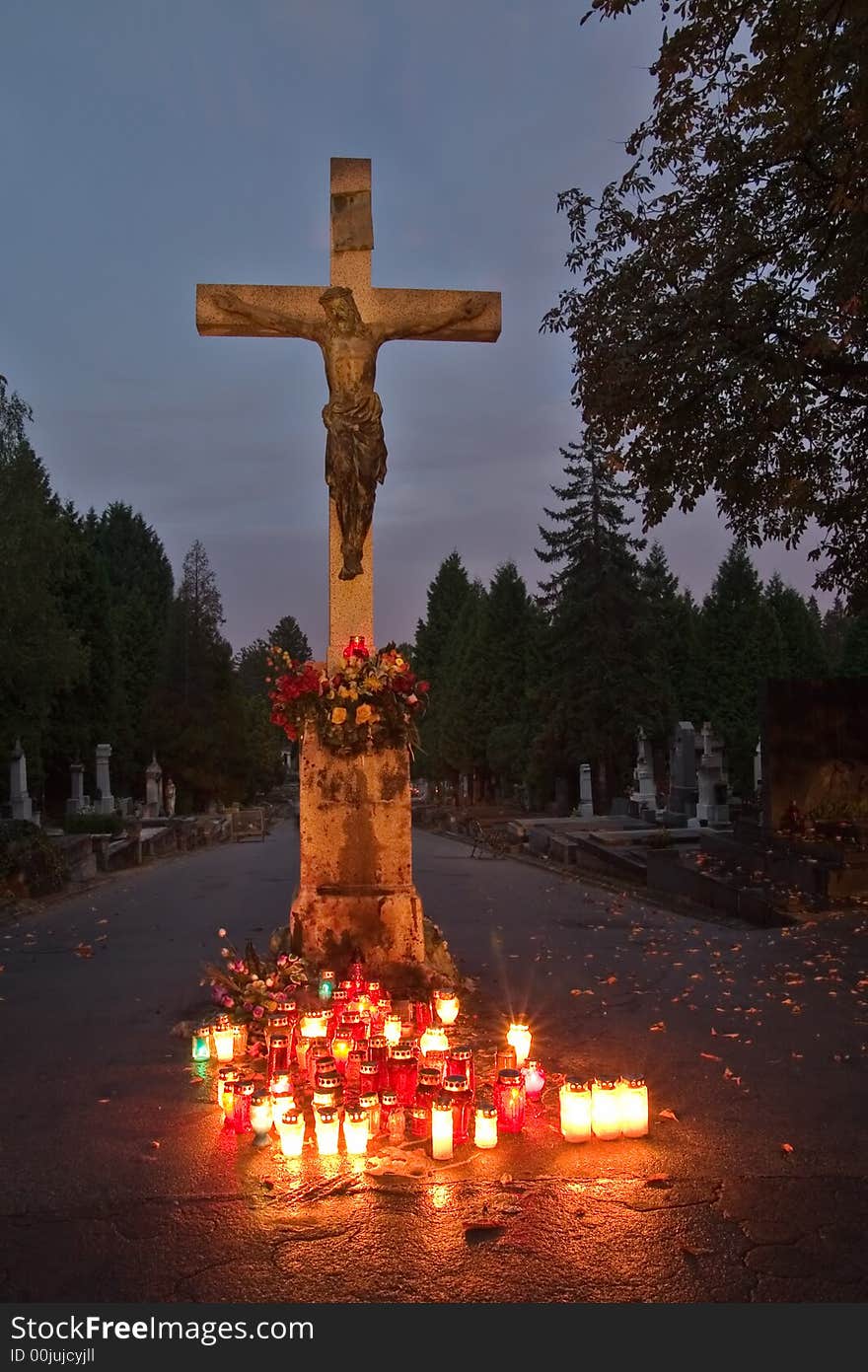 Cross on the cemetery at night
