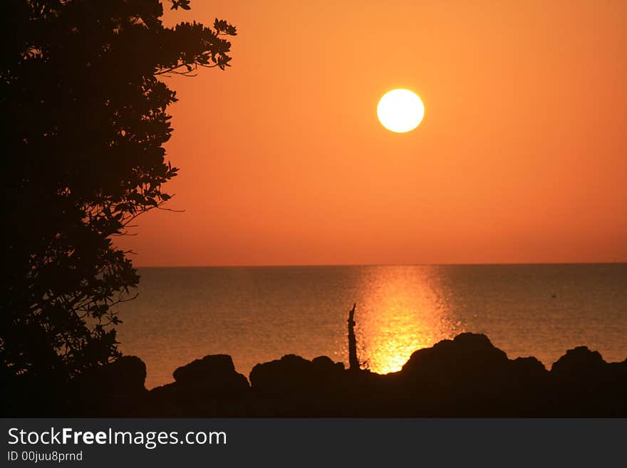 Sun comming up over the ocean on a bright morning. Sun comming up over the ocean on a bright morning