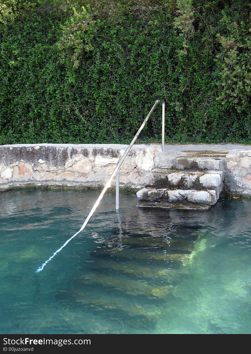 A pool ladder and relaxation water. A pool ladder and relaxation water