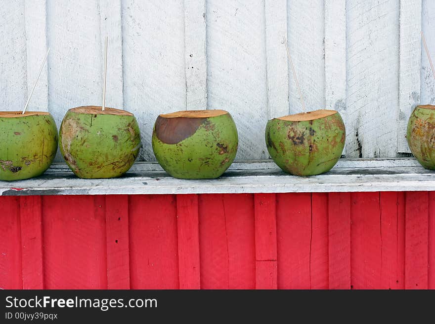 Wooden red tent for commerce of coconuts. Wooden red tent for commerce of coconuts