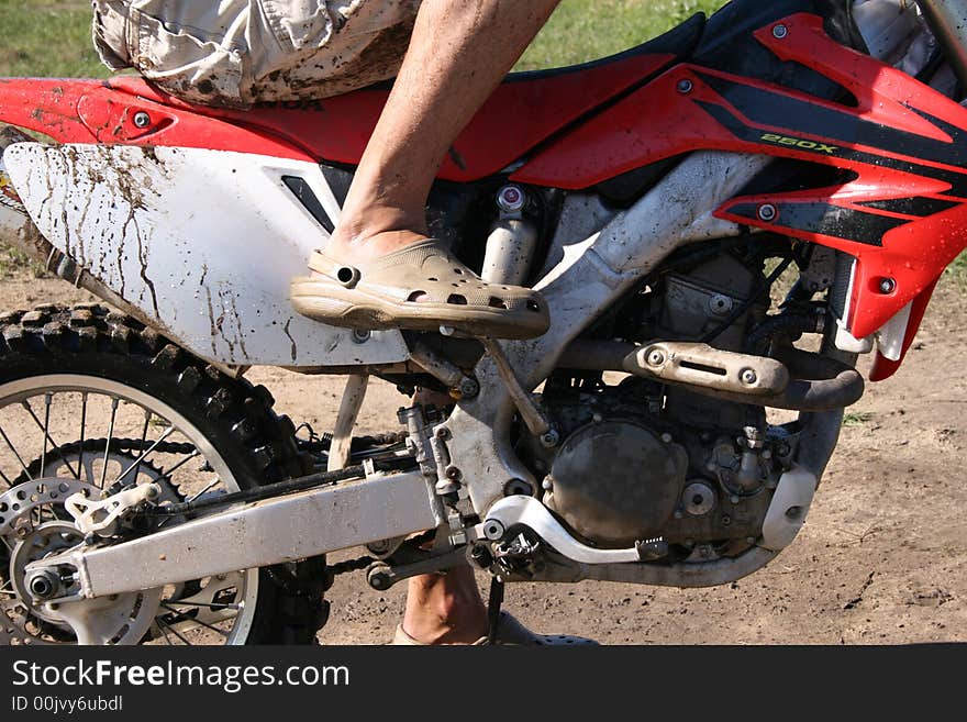 Young man having fun on a motorbike. Young man having fun on a motorbike