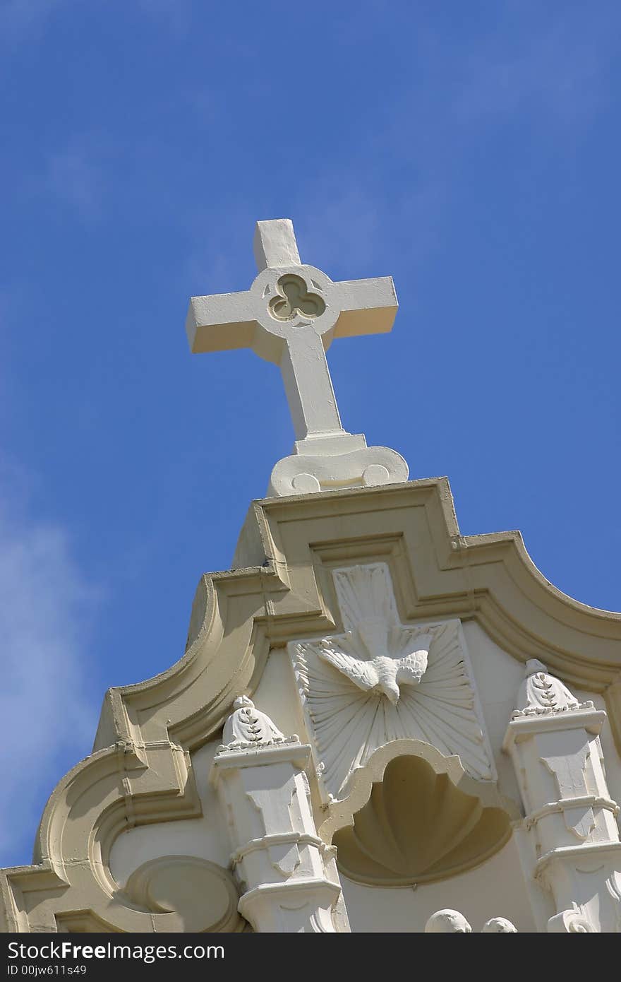 Abstract style image of a cross atop a church with blue sky. Abstract style image of a cross atop a church with blue sky.