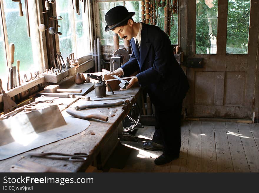 Model Plumber in his Workshop