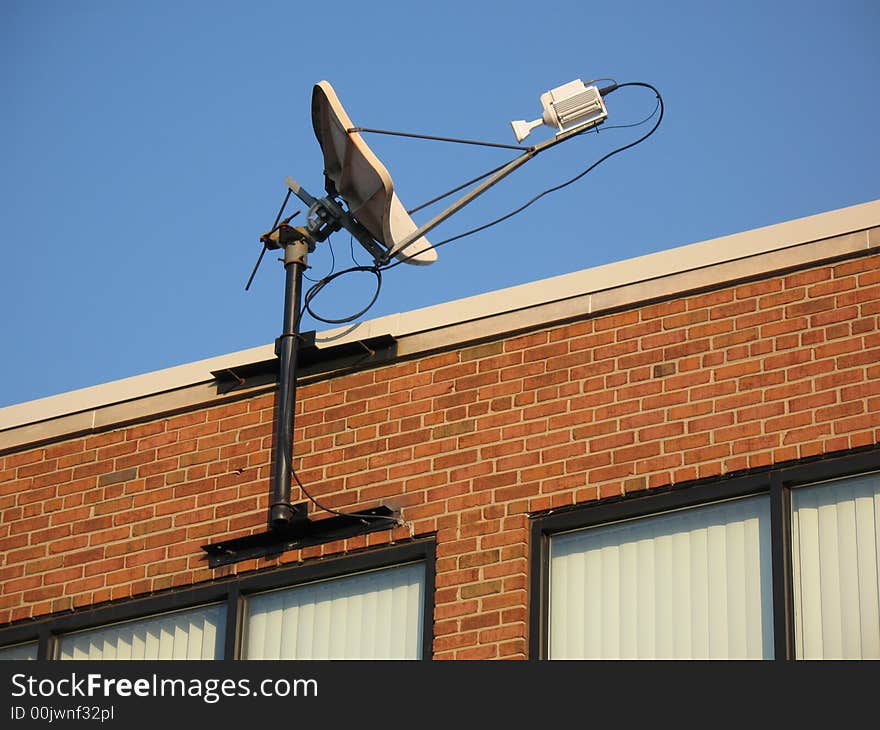 Photo of small satellite dish for a business. Photo of small satellite dish for a business.