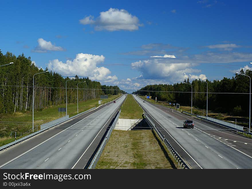 Two directions of asphalt in the srteet.