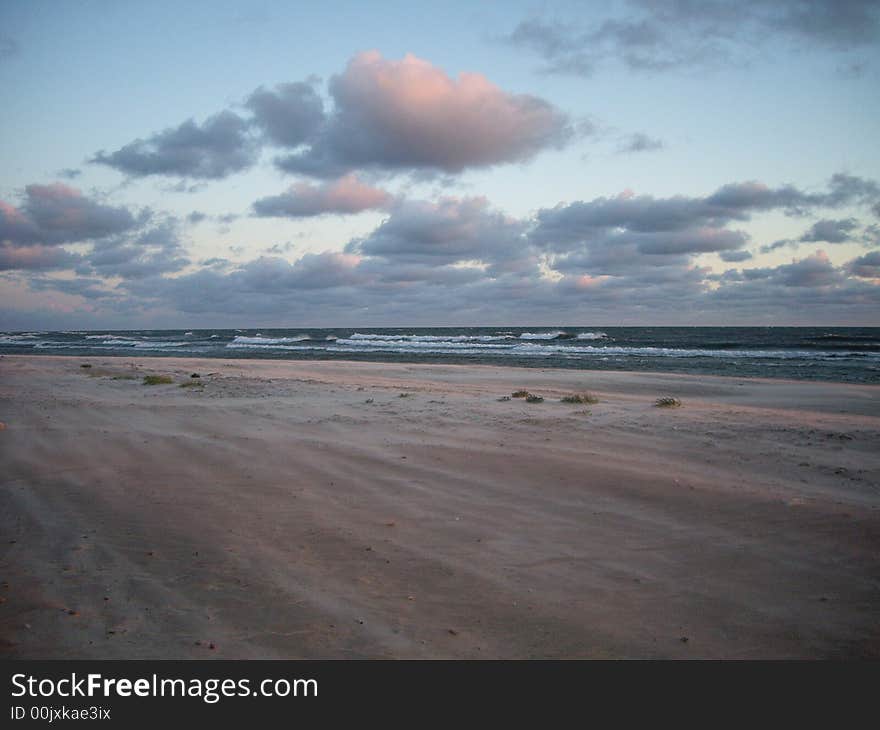 Beautiful beach at the Baltic Sea in cloudy evening. Beautiful beach at the Baltic Sea in cloudy evening