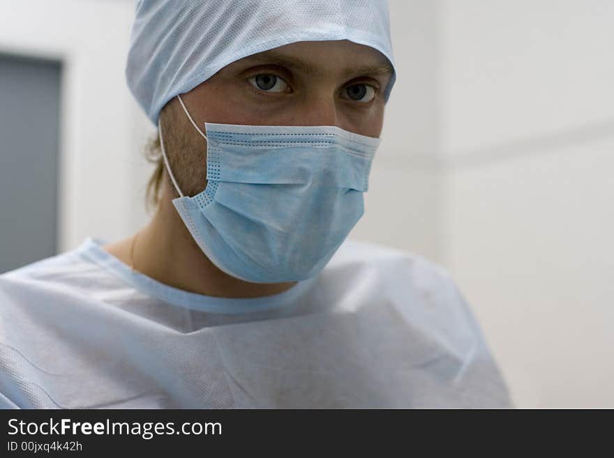 Portrait of the doctor with a bandage on the person. Portrait of the doctor with a bandage on the person