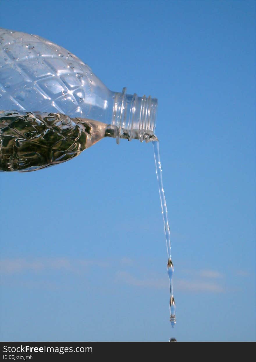 Pouring water from a bottle