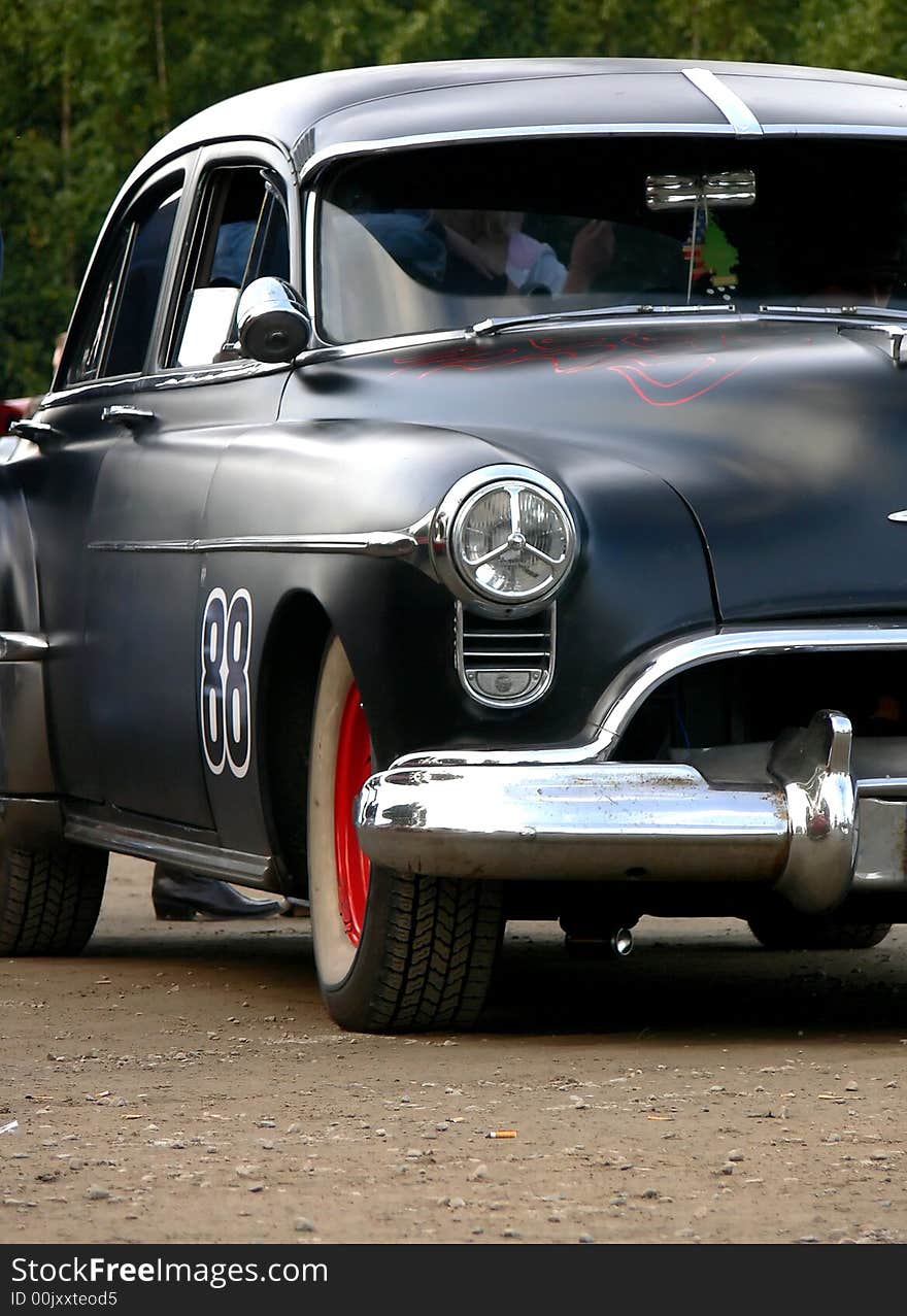 Number 88, an all black race car from the 50s. Number 88, an all black race car from the 50s.