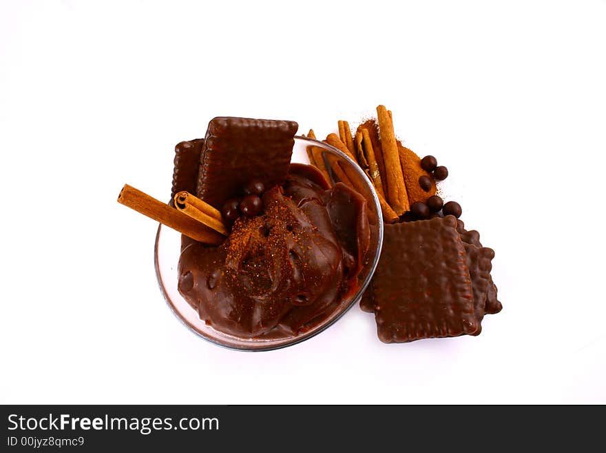 A ripe brown cinnamon in chocolate dipping sauce. A ripe brown cinnamon in chocolate dipping sauce.