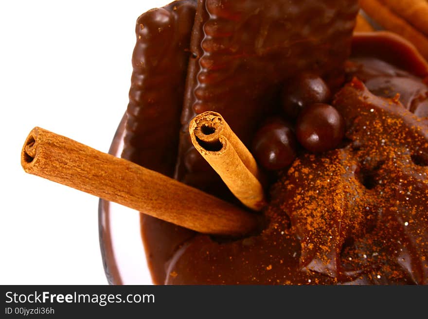 A ripe brown cinnamon in chocolate dipping sauce. A ripe brown cinnamon in chocolate dipping sauce.