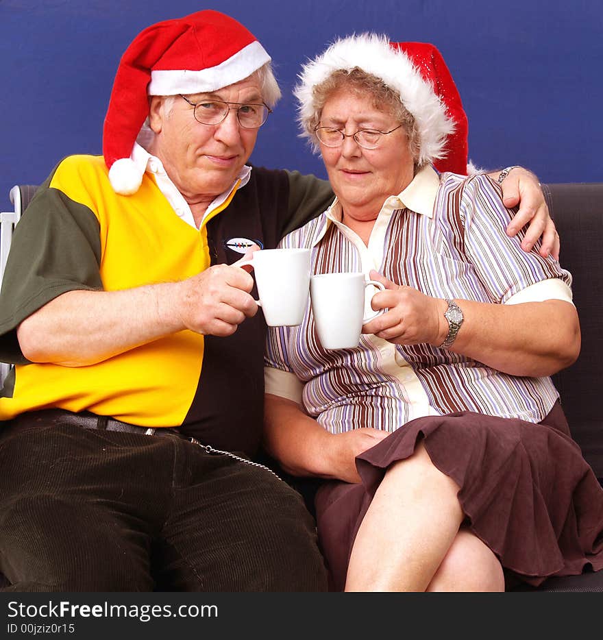 Having a coffee at christmas elderly couple. Having a coffee at christmas elderly couple