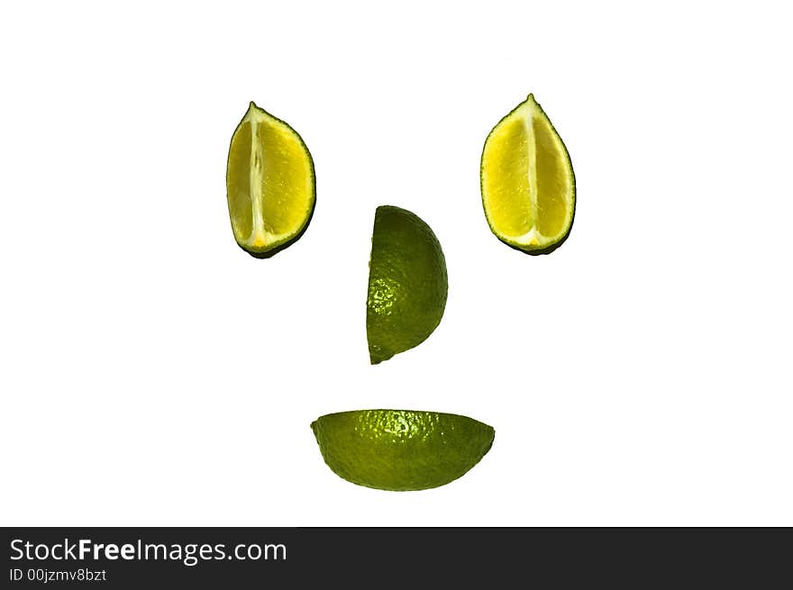 Clown's face made from cut lime wedges. Clown's face made from cut lime wedges