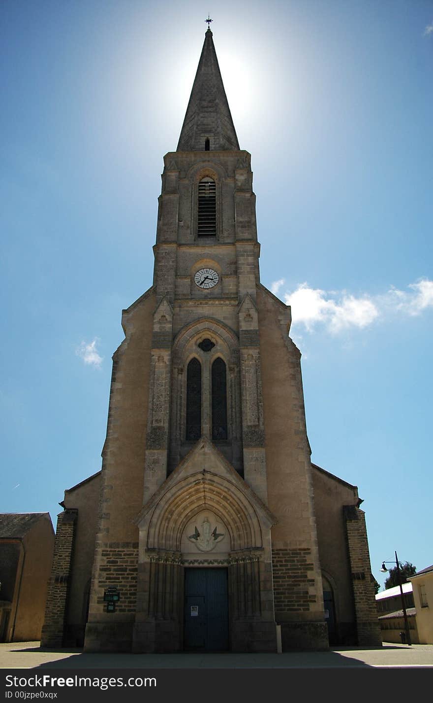 A front side of a gothic church in france