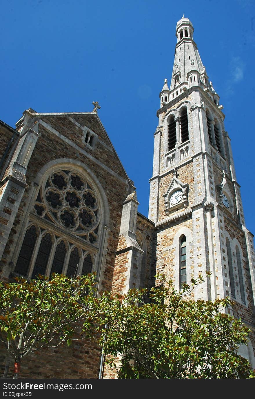 A front side of a gothic church in france