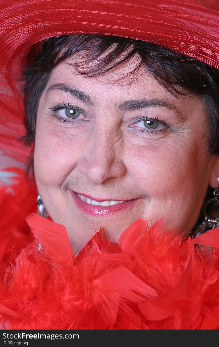 Portrait of a woman in red hat close-up