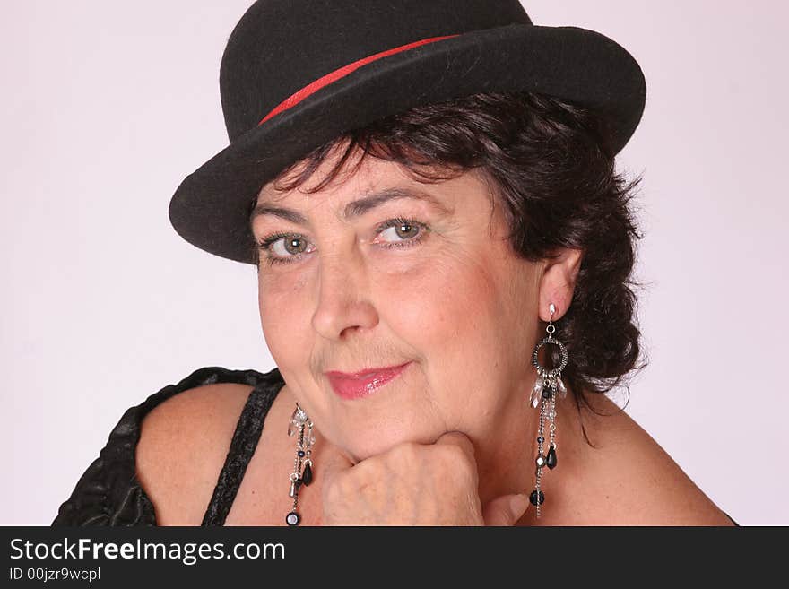 Portrait of a woman in  hat close-up. Portrait of a woman in  hat close-up