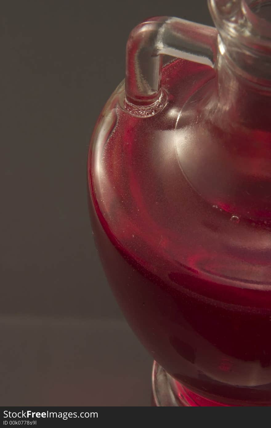 A glass vessel holding communion wine