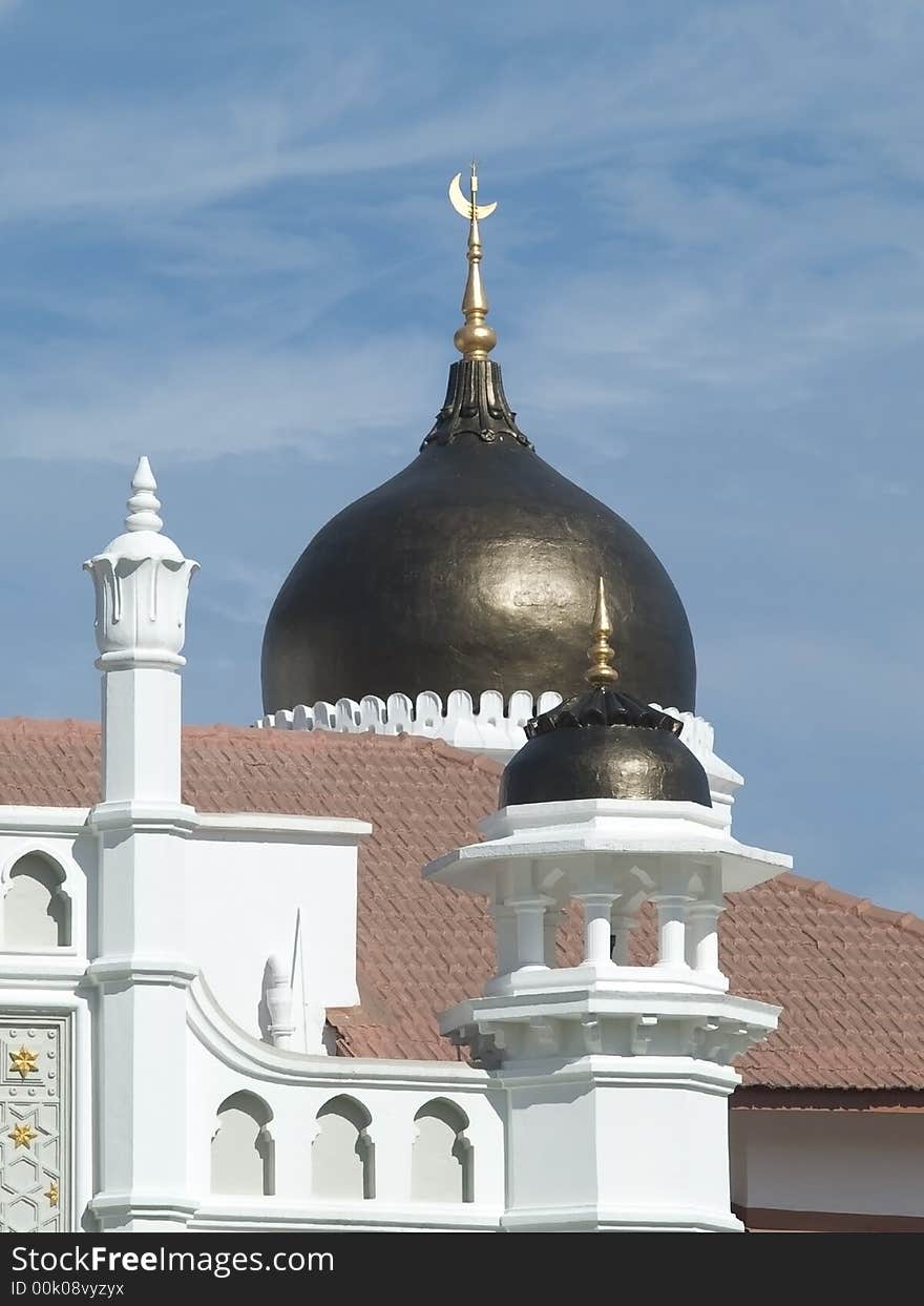 Details of the Kapitan Keling mosque in Georgetown, Penang, Malaysia, decorated with Malaysian flags. Details of the Kapitan Keling mosque in Georgetown, Penang, Malaysia, decorated with Malaysian flags.