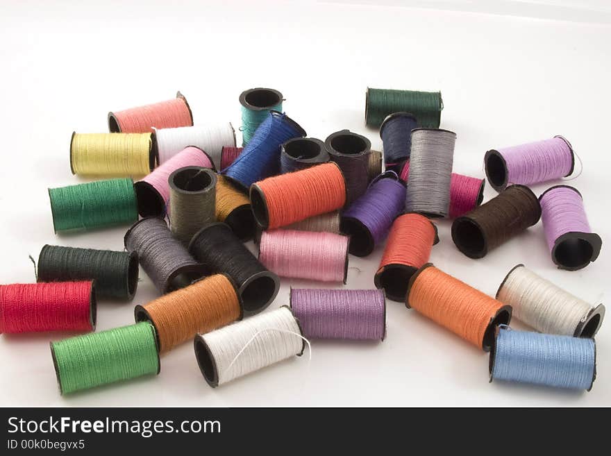 A collection of coloured thread. A collection of coloured thread