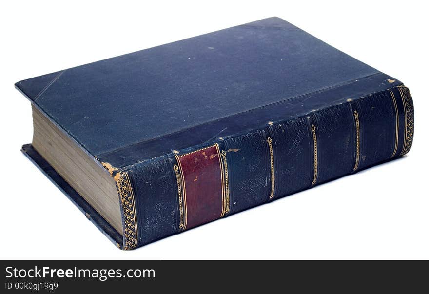 An antique book lying flat as on a table. An antique book lying flat as on a table.