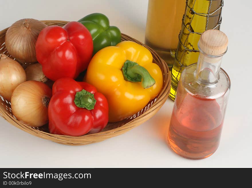 Basket With Peppers And Oil