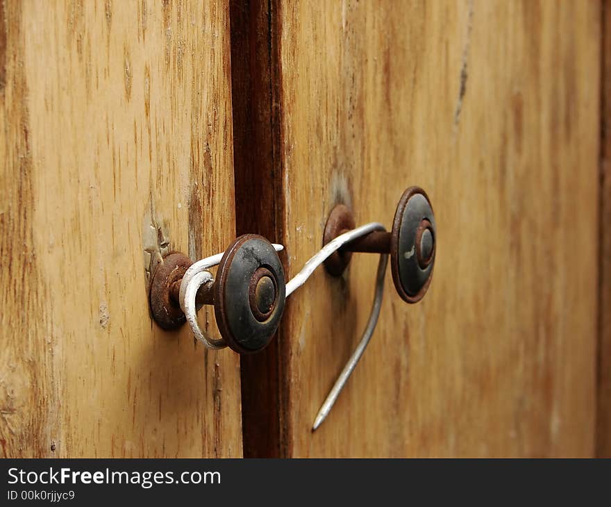 Bad lock on the wooden doors