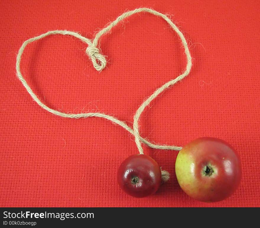 Red Apple And String In Form O