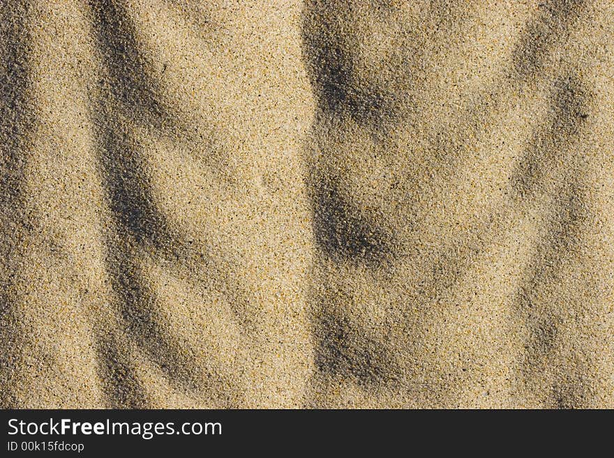 Abstract artistic sand background on the beach