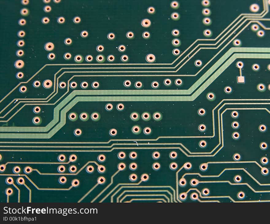 Circuit paths on a green circuit board. Circuit paths on a green circuit board