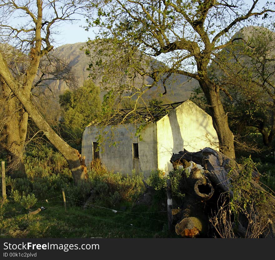 Deserted and derelict farmhouse near Paarl, South Africa at sunset. Deserted and derelict farmhouse near Paarl, South Africa at sunset.