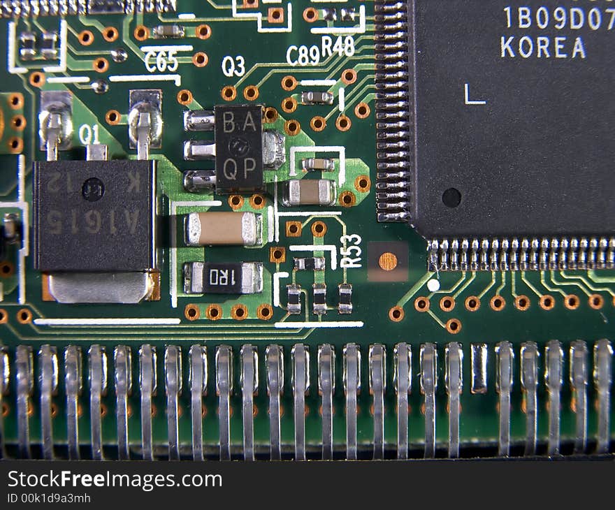 Surface mount chips and components near an edge connector on a circuit board. Surface mount chips and components near an edge connector on a circuit board.