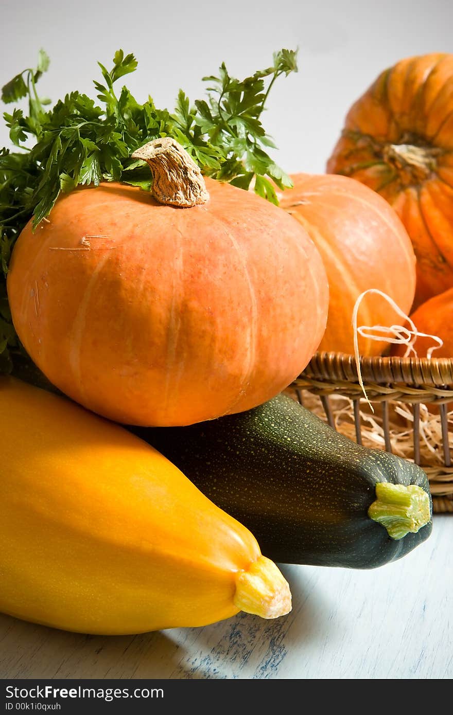 Orange pumpkins and marrows in the table. Orange pumpkins and marrows in the table