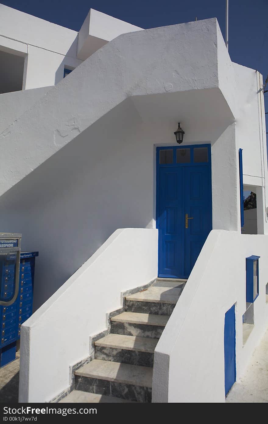 Cute typical greek house in blue white still