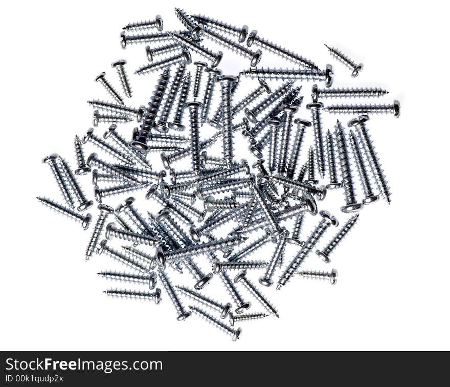 Many Spiral Metal Screws On A White Background