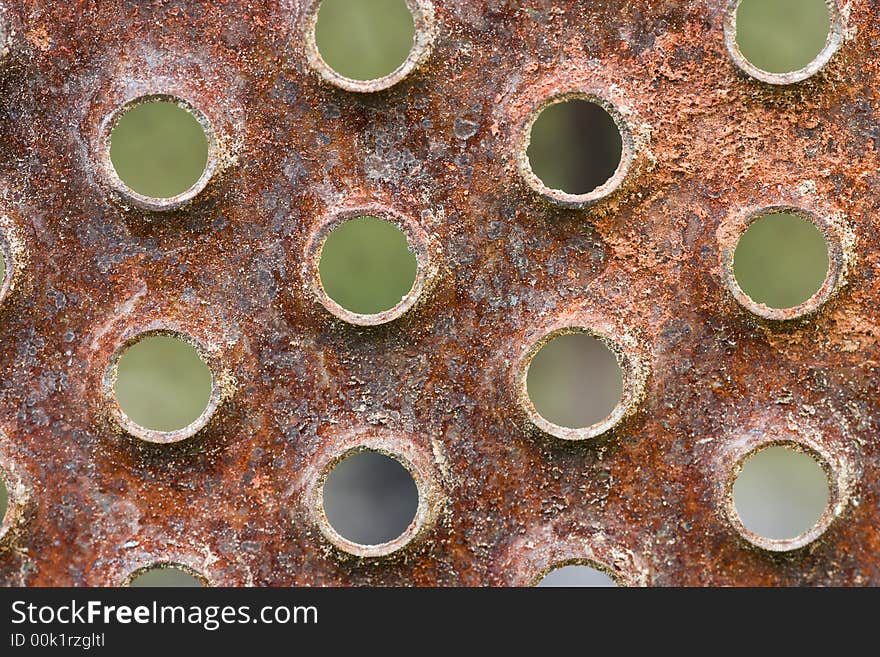 Rusted iron surface, intended as background or wallpaper. Rusted iron surface, intended as background or wallpaper