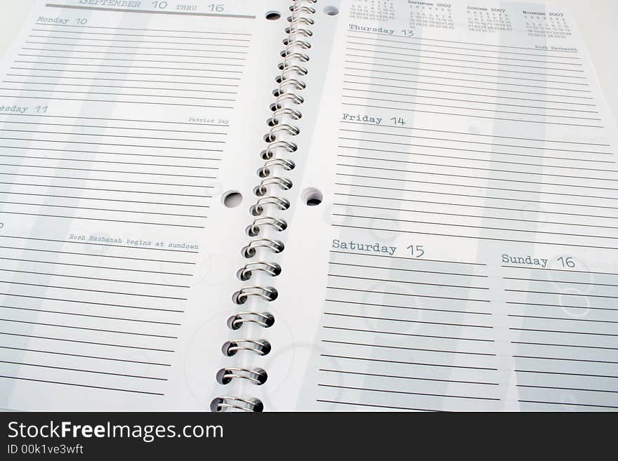 A Close up image of a Dayplanner